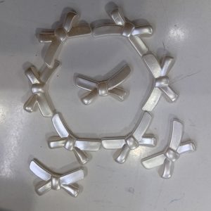 پیکسل سه بعدی پاپیون سوراخ دار رنگ صدفی
